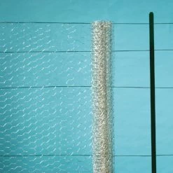 Grillage Poulailler Acier Galvanisé Triple Torsion 25m X 1m Galvanex - Nortene 10 Grillage Poulailler Acier Galvanisé Triple Torsion 25m X 1m Galvanex - Nortene -Fournitures De Volaille grillage poule triple torsion galvanis nortene vue fond bleu 1